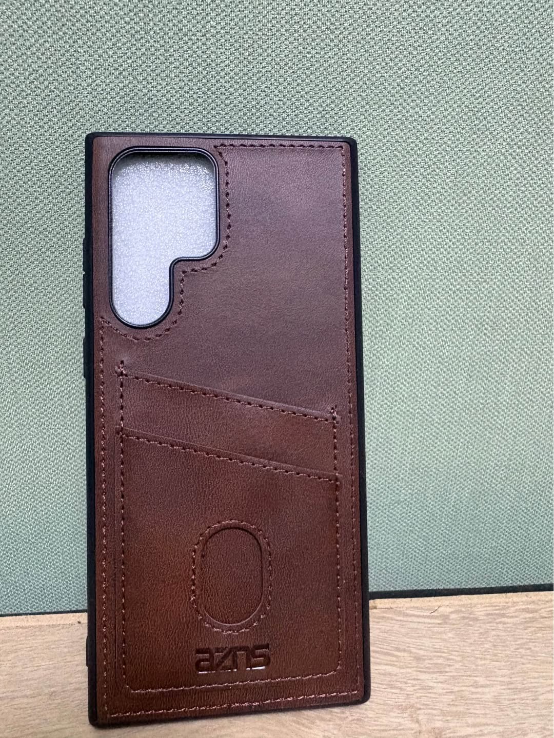 Brown leather phone case with cards