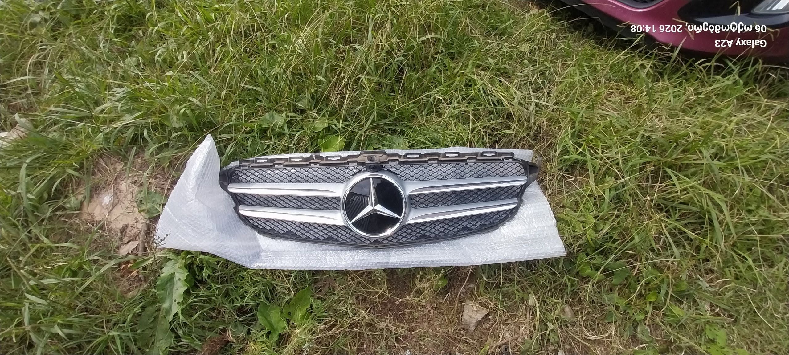 Original car grille with star emblem