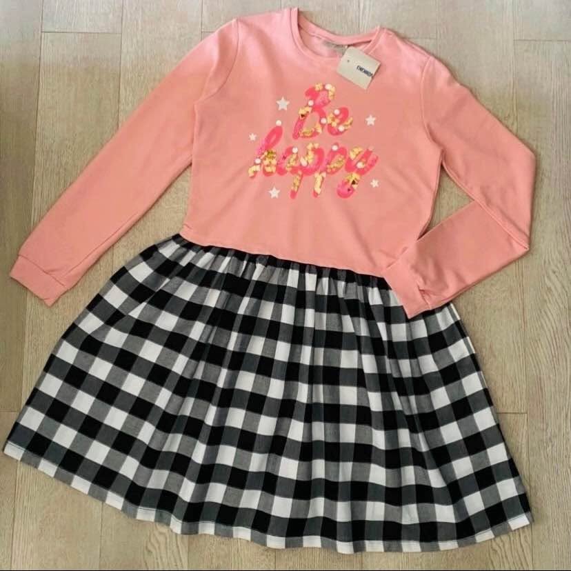 New dress with a Be Happy label