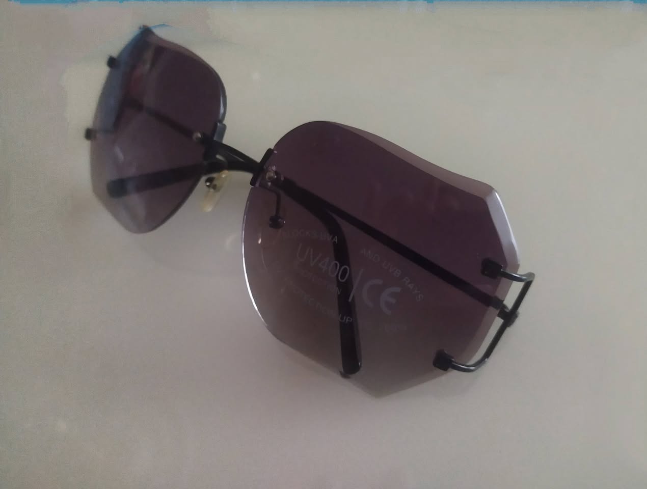 Rimless UV400 sunglasses, unused