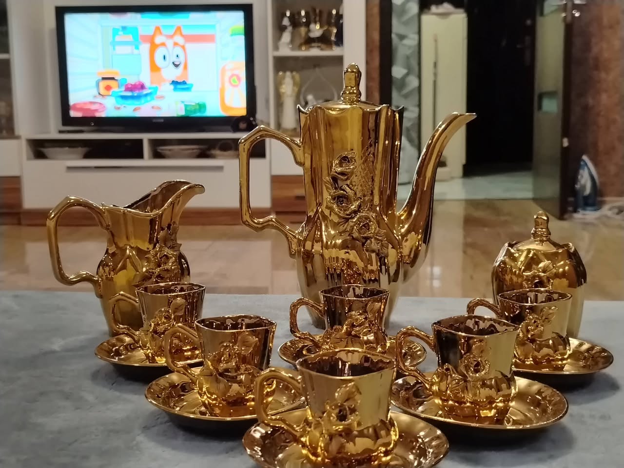 Gold ceramic coffee and tea set