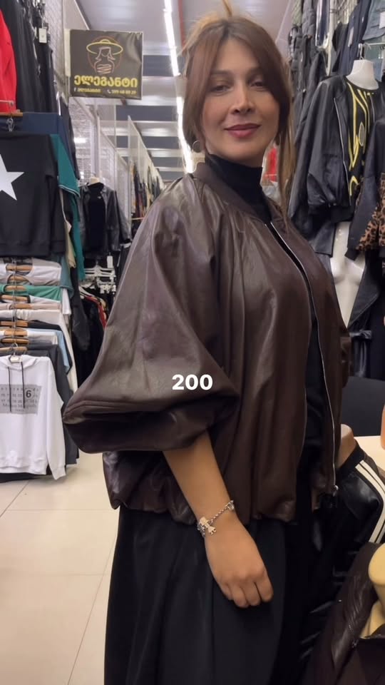 Brown leather jacket with balloon sleeves