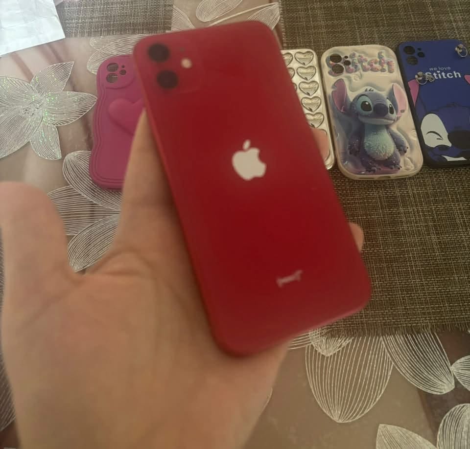 Red iPhone, battery 70%