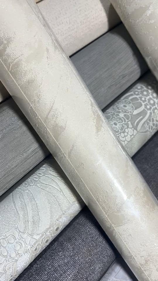 Wallpaper rolls, beige textured