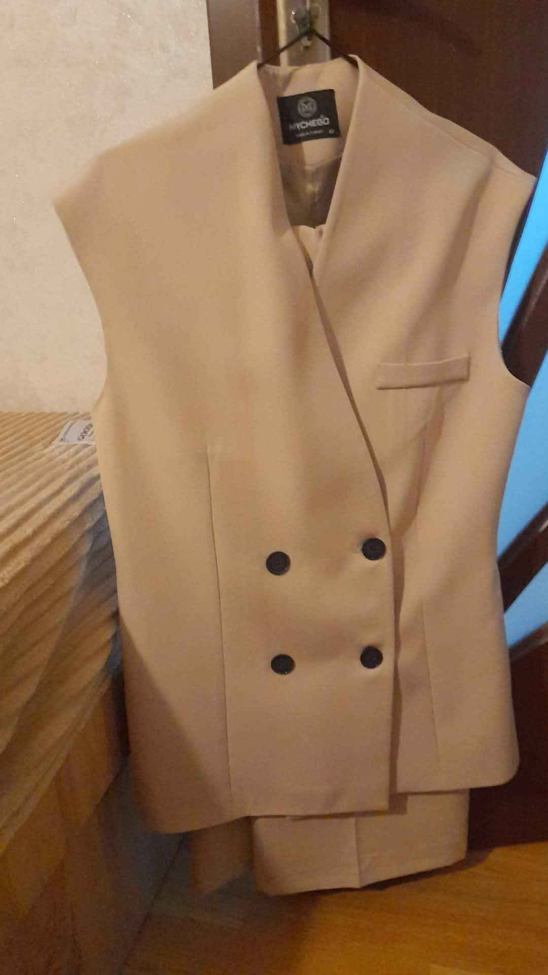 Beige suit jacket and trousers