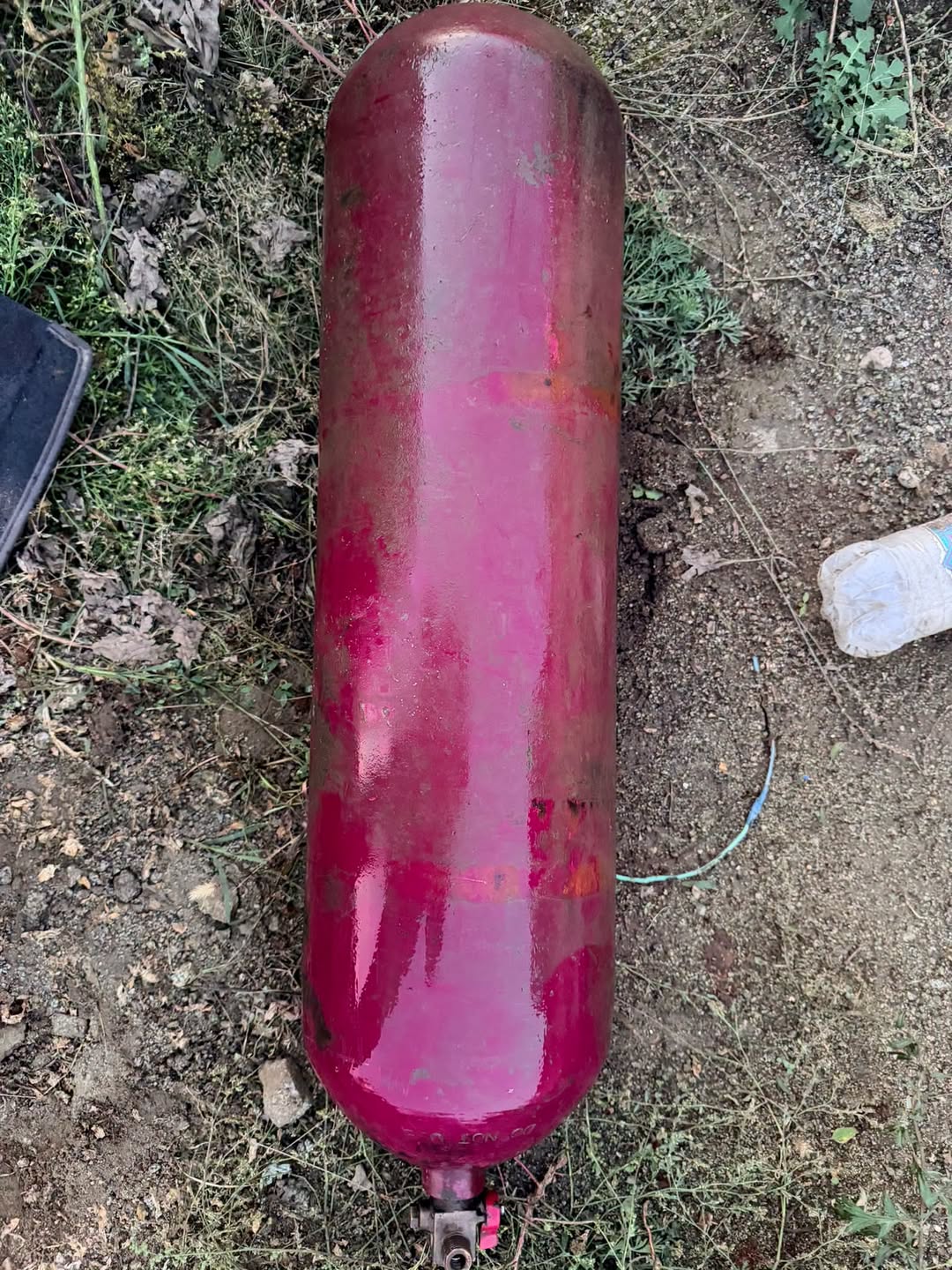 Red CNG gas cylinder with valve