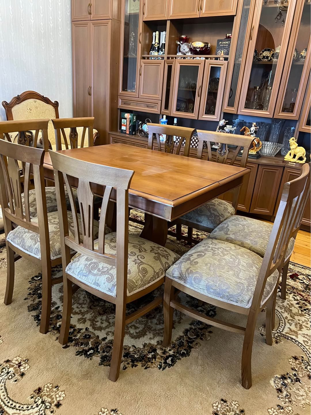 Extendable wooden dining table with 8 chairs