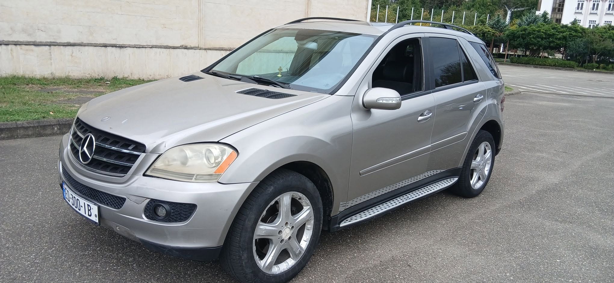 Silver Mercedes SUV, 5.0 petrol