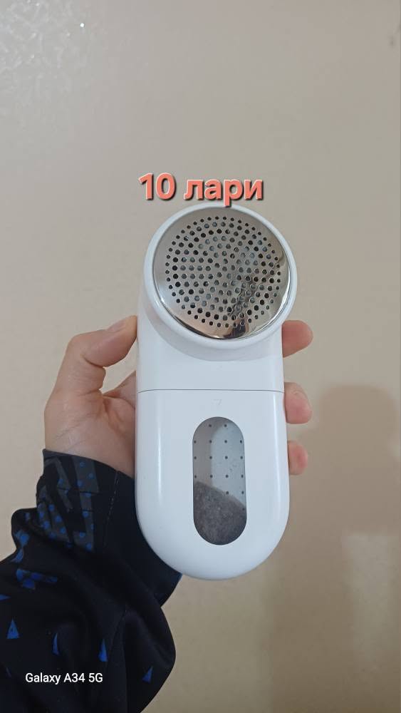 White electric fabric shaver, pickup Avlabari