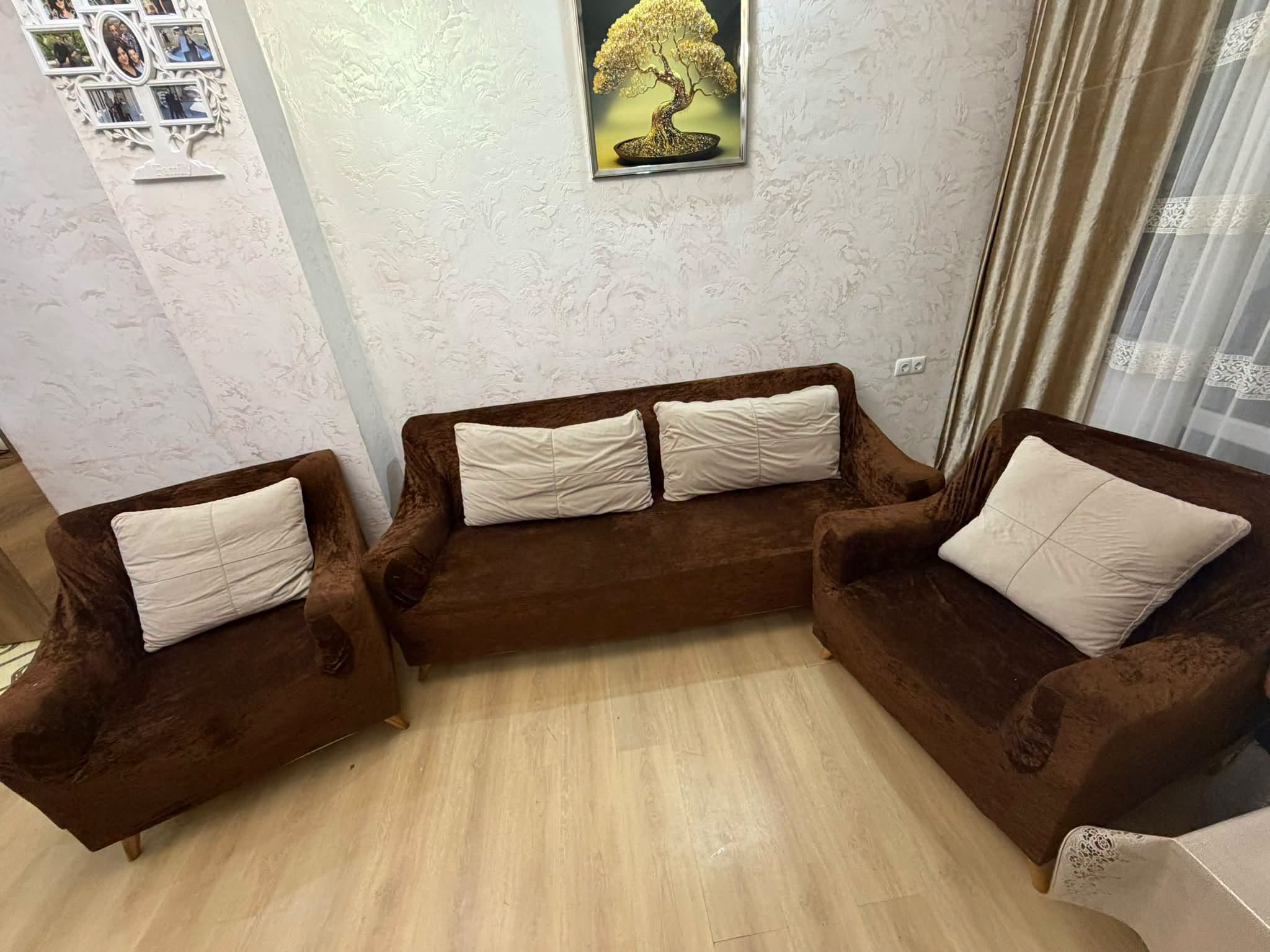 Selling a triple sofa from the family has storage compartments